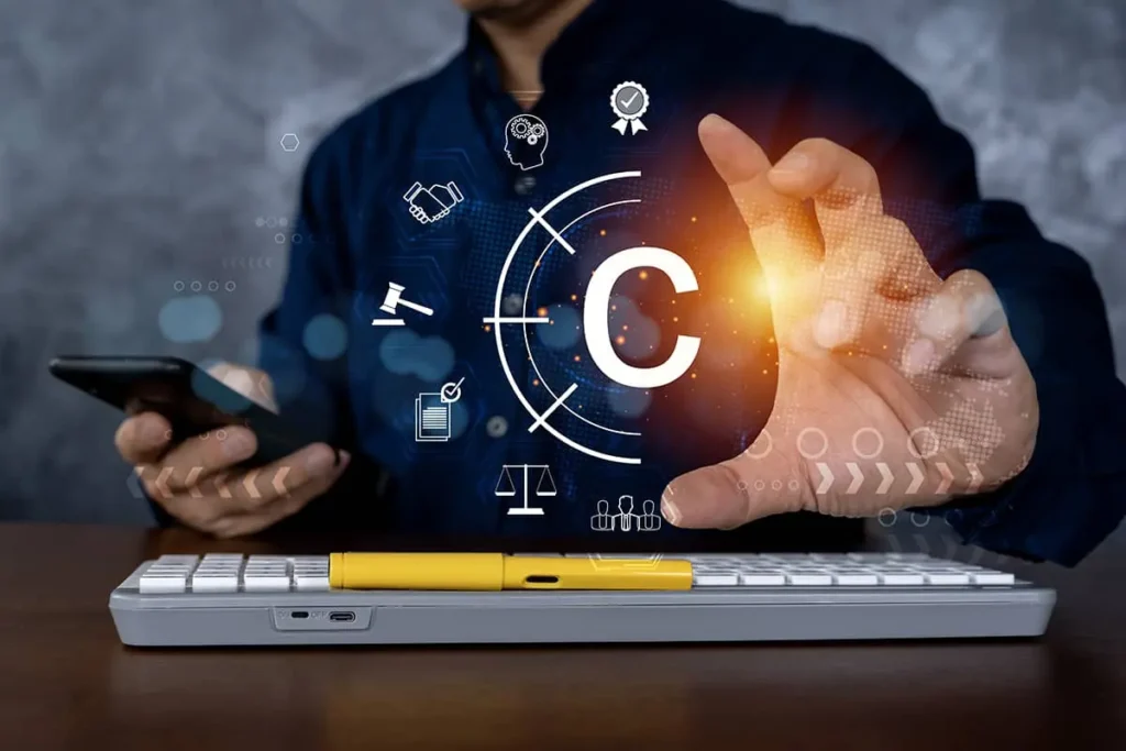 Людина у смартфоні набирає літеру "c", взаємодіючи з віртуальними піктограмами, - ліцензії на інтелектуальну власність